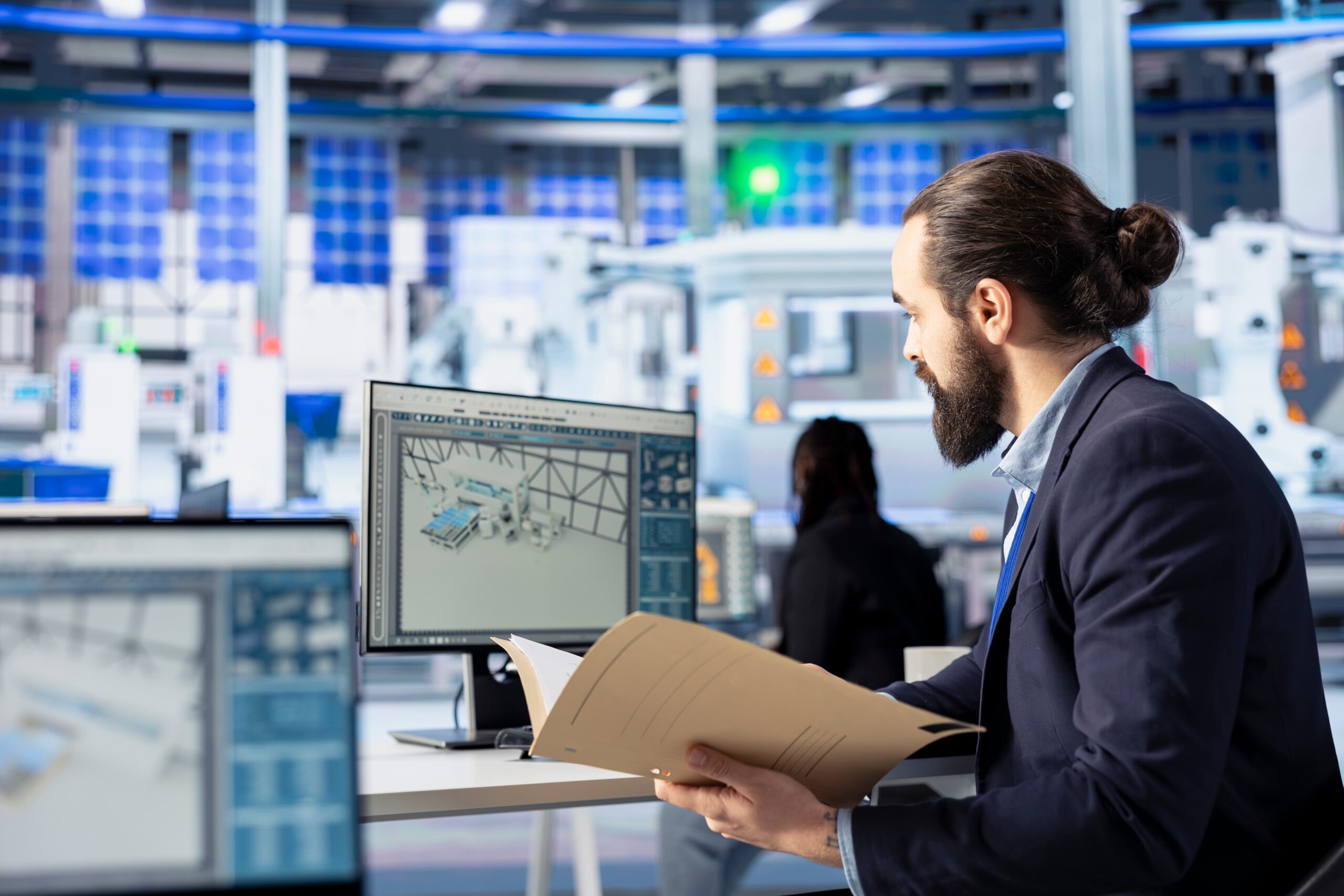 man-solar-panel-factory-inspects-production-process-checking-paperwork (1)
